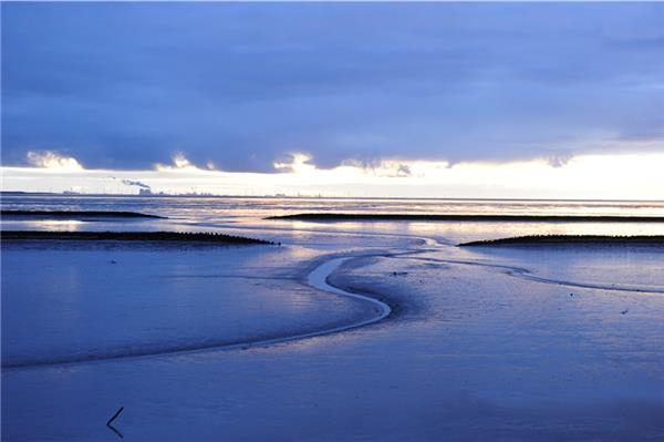 Wattenmeer vor Norderney: Auch diese Gebiete sind durch die globale Erwärmung bedroht. 